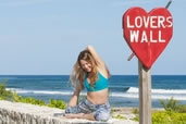 Annie, at Lovers Wall on East End, Cayman Islands