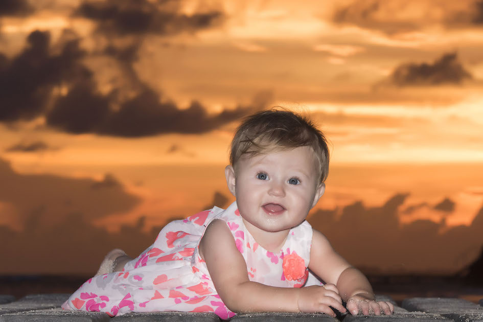 Beautiful little girl with a beautiful sunset, Cayman Islands. More Photos Here.