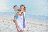 Brother and Sister on 7-Mile Beach, Cayman Islands.