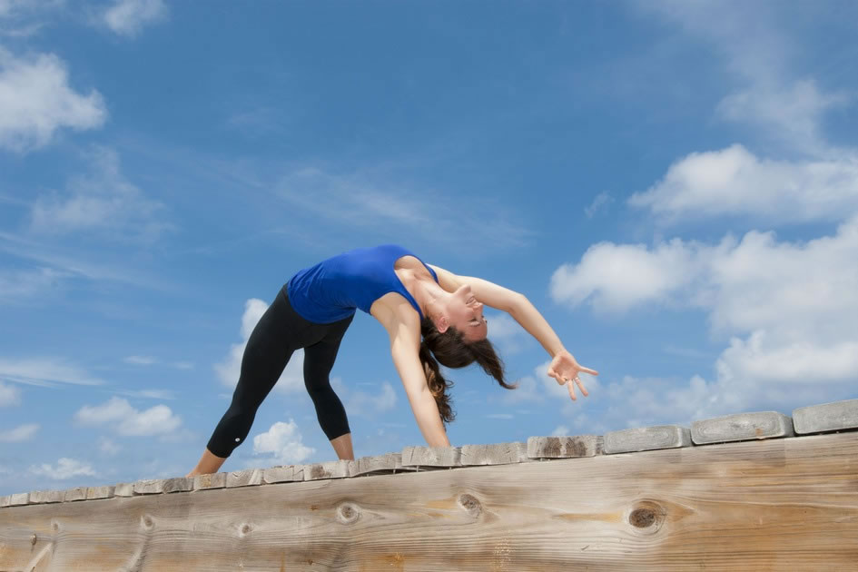 Chantelle in flipped downward dog, Cayman Islands