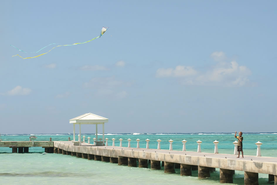 Caden flies a kite, Rum Point, Grand Cayman