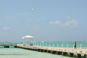 Caden flies a kite, Rum Point, Grand Cayman
