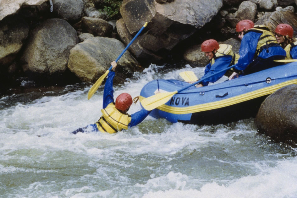 Rafters trying to pull in one of their own down the Numbers Rapids