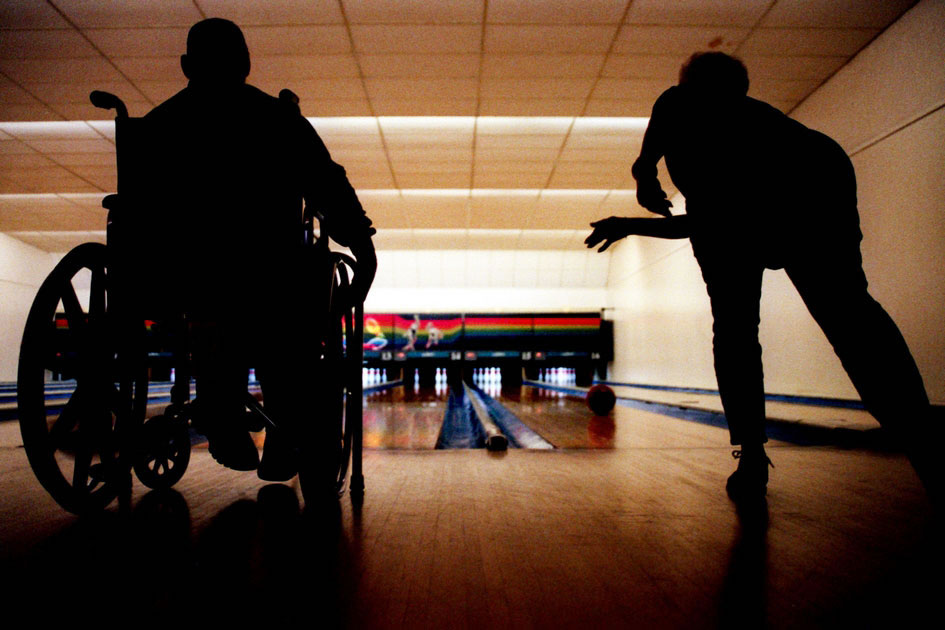 Handicapped people on a day out bowling