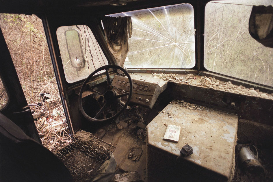 A once loved, now abandoned, Dodge Van in the forest, Athens