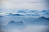 The misty morning view seen from Christ the Redeemer, Rio de Janerio.