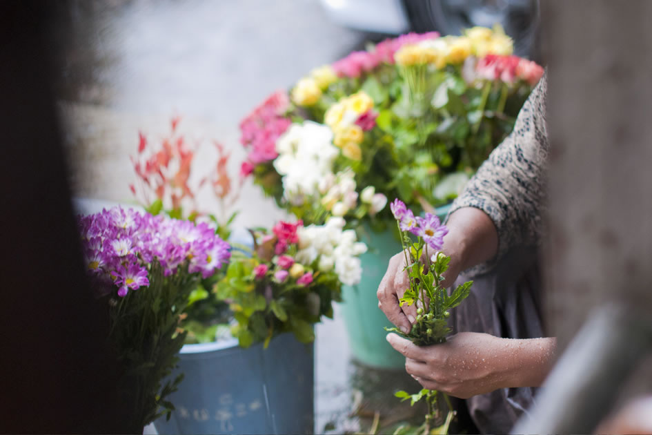 Flower saleswoman, streets of Yangon