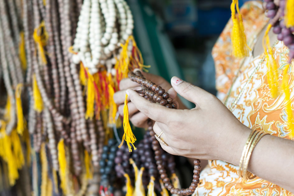 Prayer bead saleswoman on the streets of Yangon