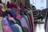 A quiet moment in a fabric shop at Bogyoke Market, Yangon